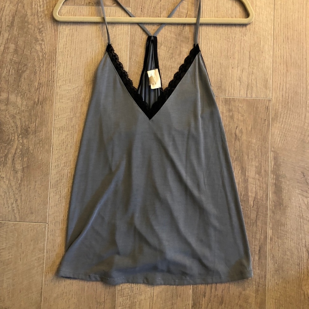 Tank Top Tags still on